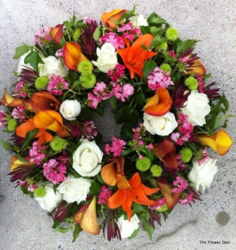 A Circular Wreath Of Summer Turns To Autumn